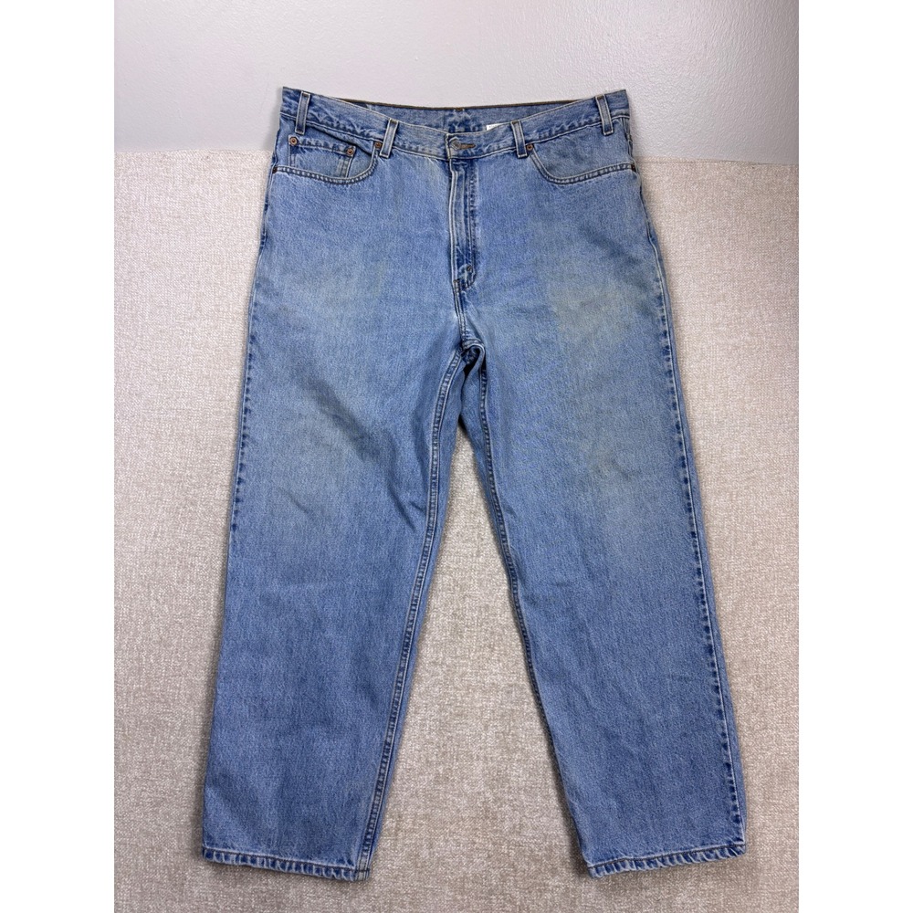Vintage Levis 550 Relaxed Fit Tapered Leg Light Wash Jeans 42x30 Blue 00550-4834